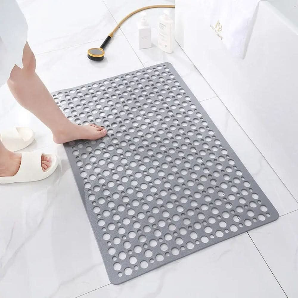 Alddal douchemat in geel van pvc with tpe content – duurzaam, waterafstotend, and long-lasting – close-up van het materiaal