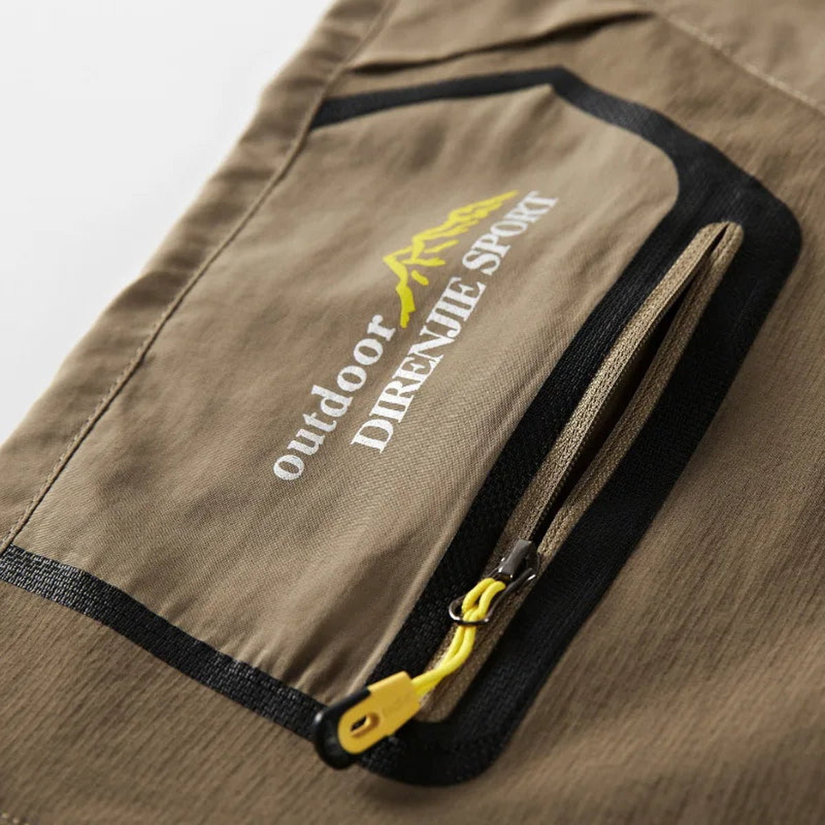 outdoorbroek in groen – detailfoto van de afwerking