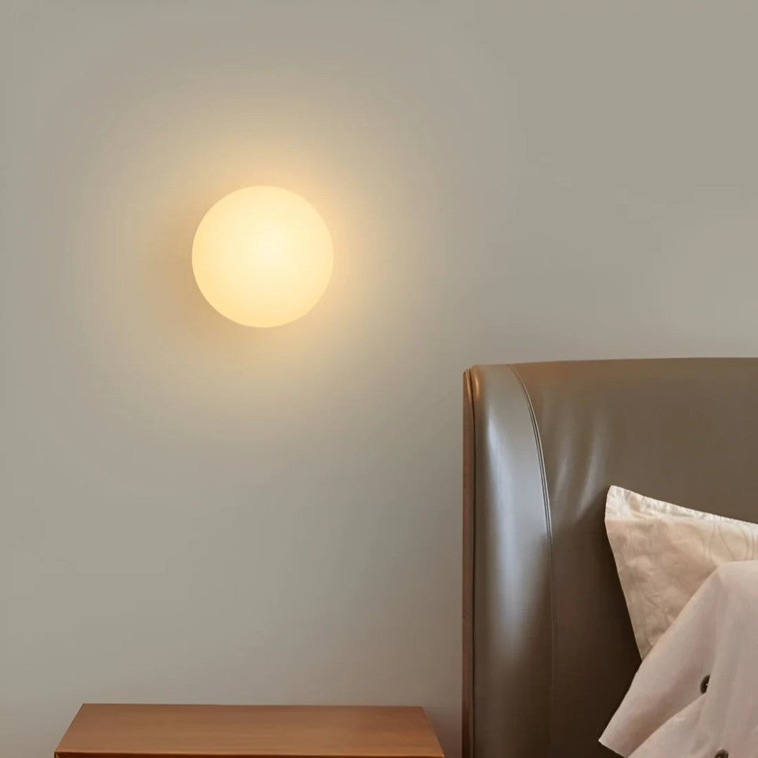 Isvik wandlamp van glas – in een woonkamer