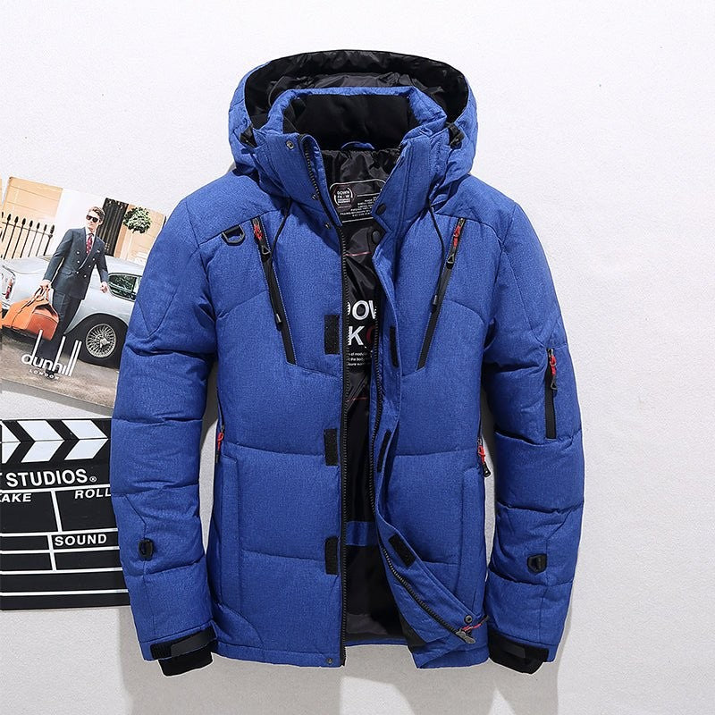 Nord763 jas in oranje van polyester outer layer + thermal inner lining – detailfoto van de afwerking