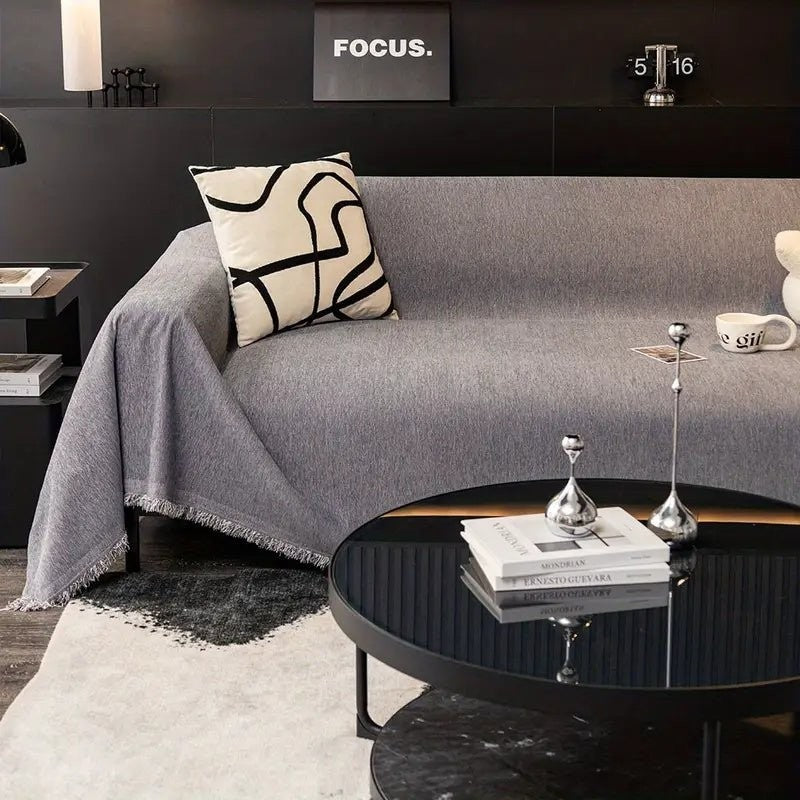 Nordal plaid in grijs – in een woonkamer