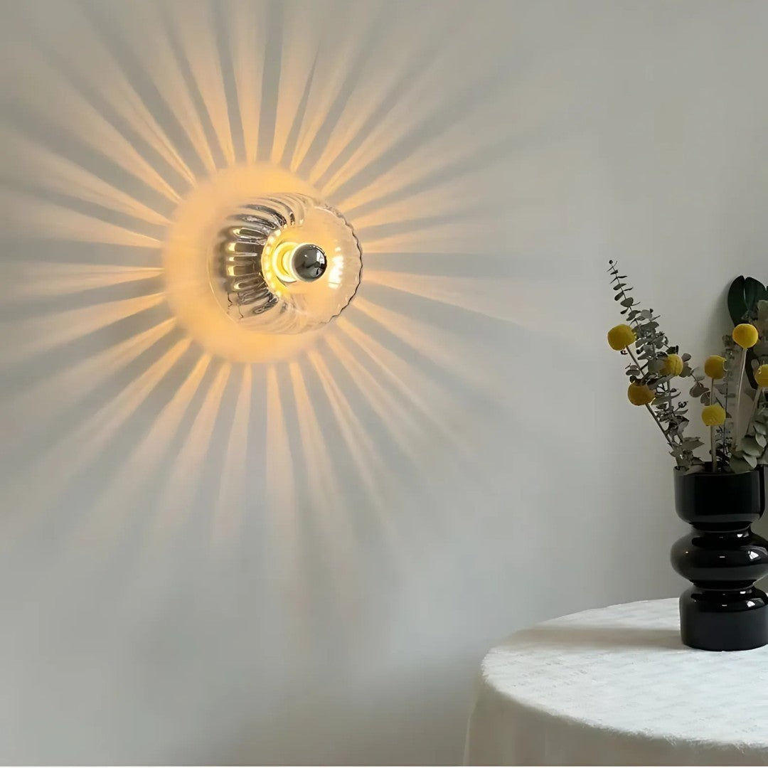 Delvik wandlamp van glas – in een woonkamer