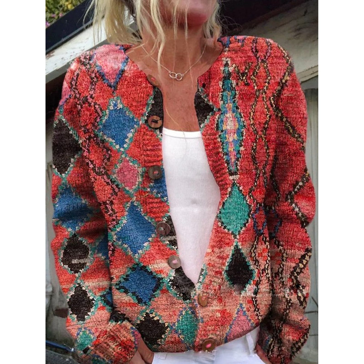 cardigan in rood – close-up