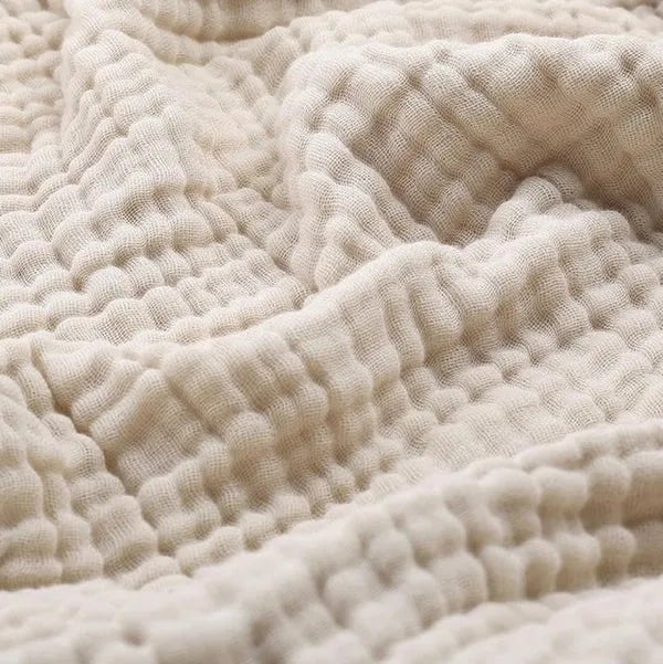 Kolstad plaid in beige van katoen – vooraanzicht