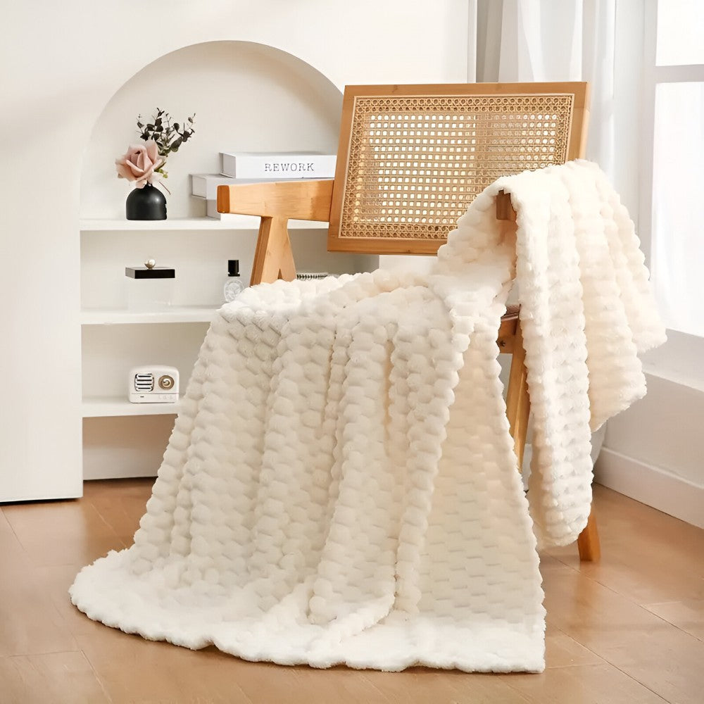 Meldra plaid van polyester – geplaatst in een interieur