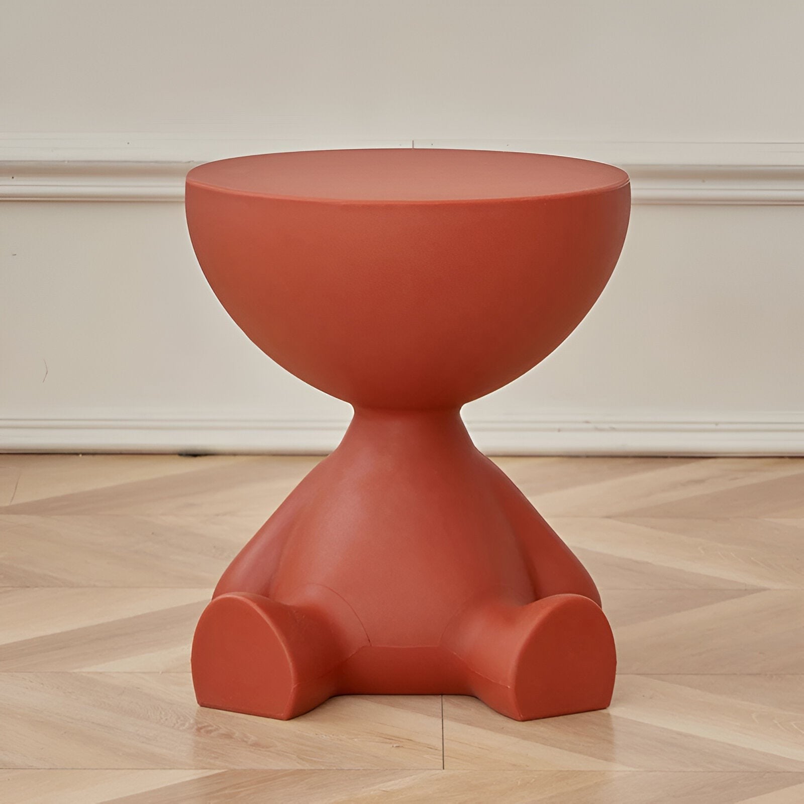 Perlan salontafel in roze van kunststof – geplaatst in een interieur