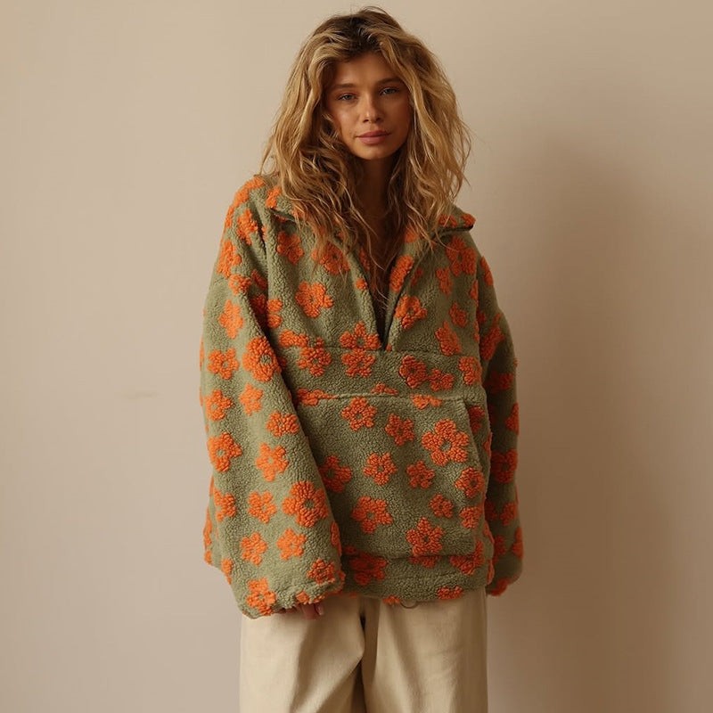 Ravena vest in oranje – detailfoto van de afwerking